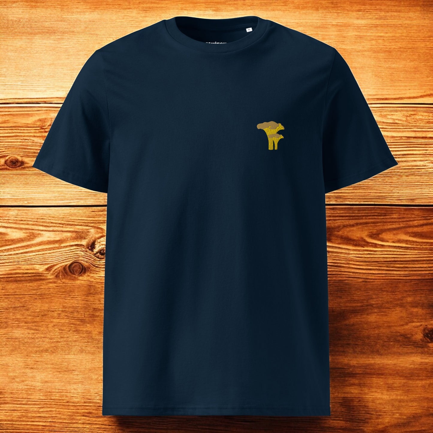 navy blue t-shirt with a chanterelle and a wood background