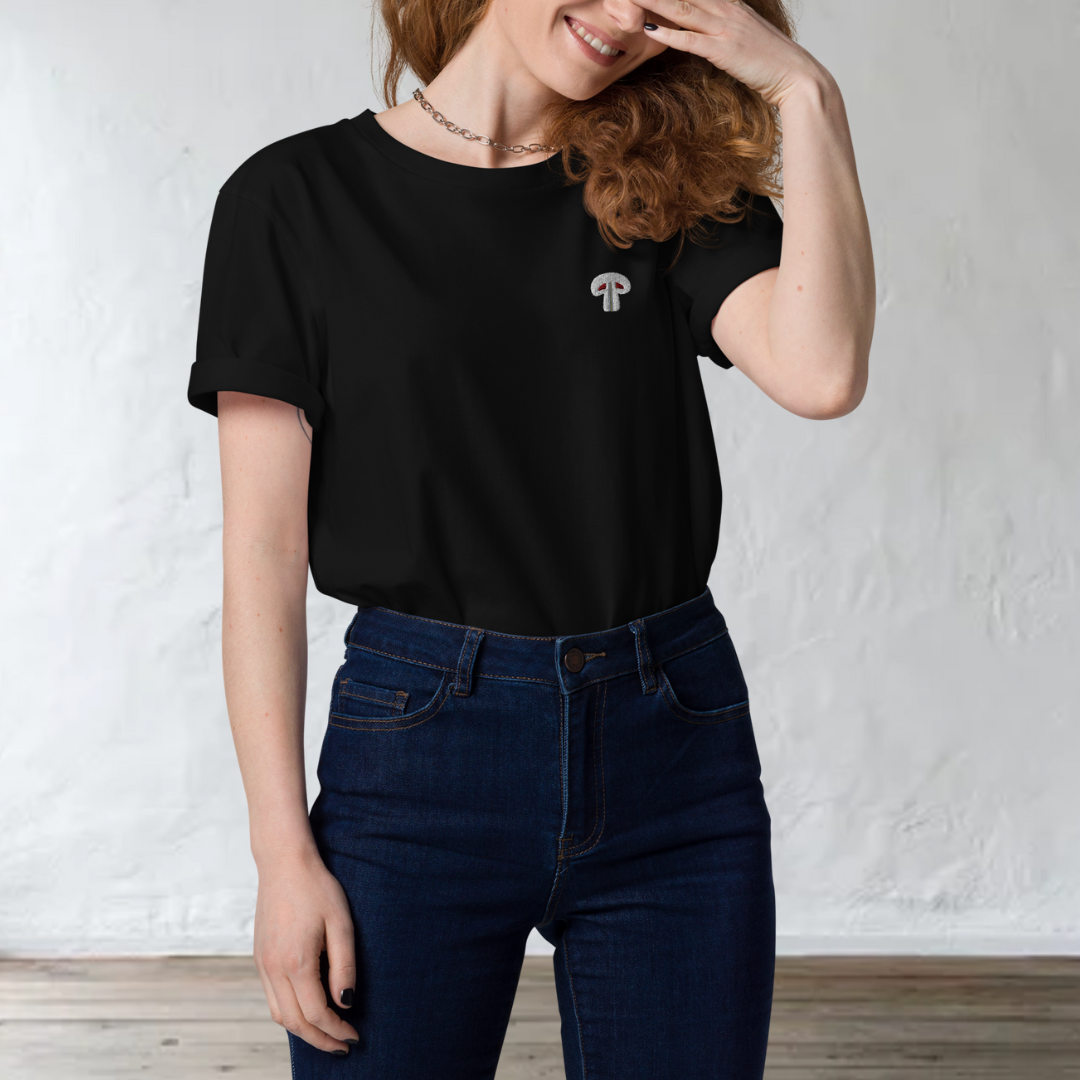 woman standing wearing black t-shirt with paris mushroom design