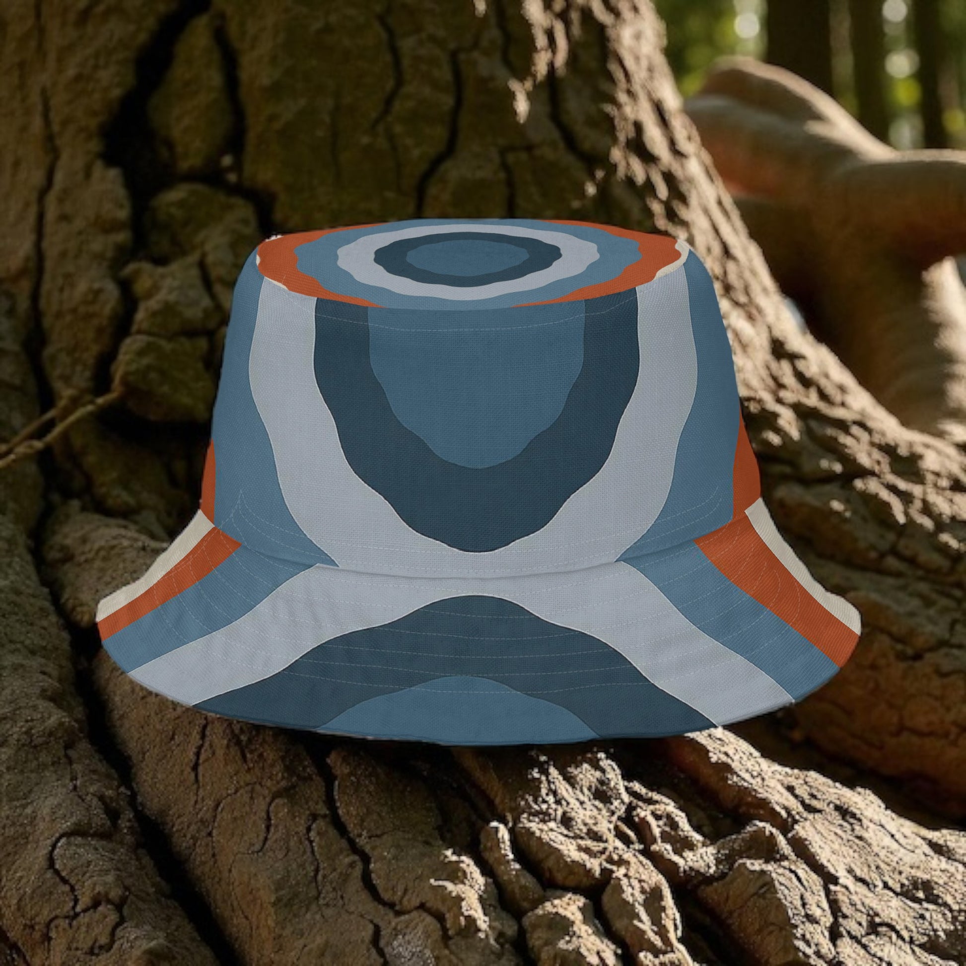 Reversible Turkey Tail Bucket Hat Blue Grey on a tree
