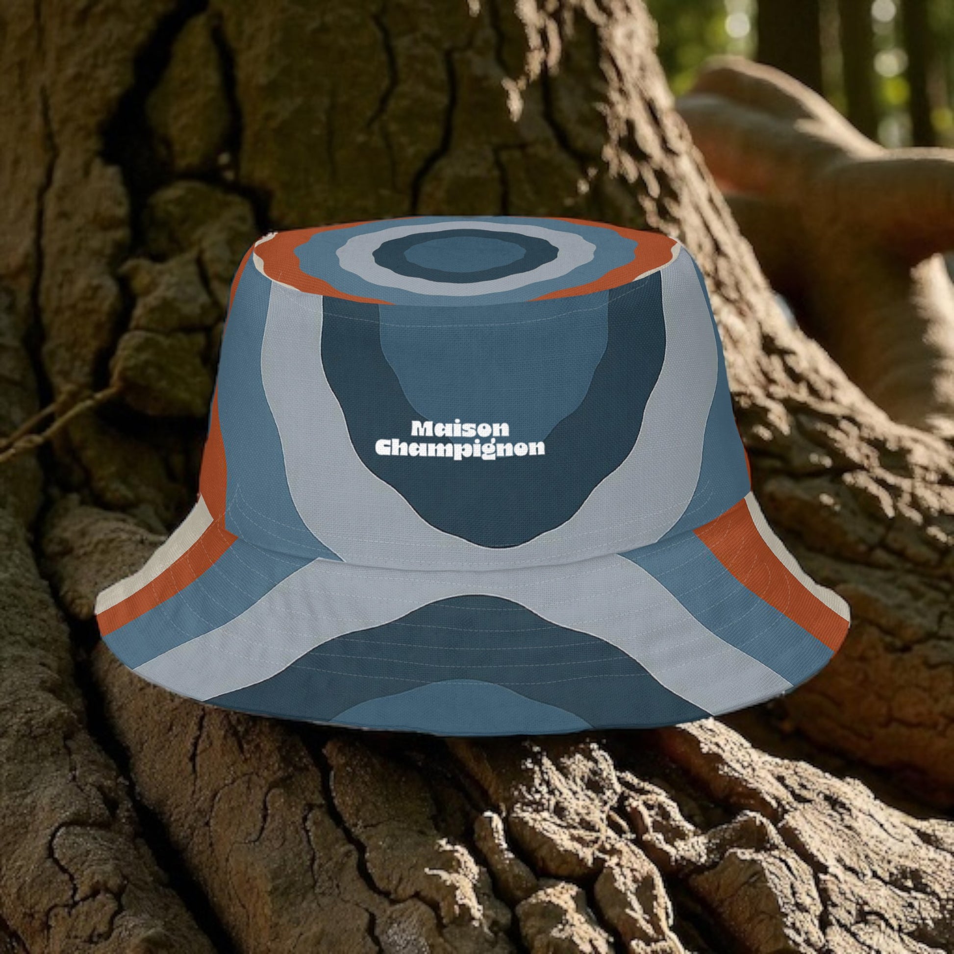 INsite Reversible Turkey Tail Bucket Hat Blue Grey on a tree