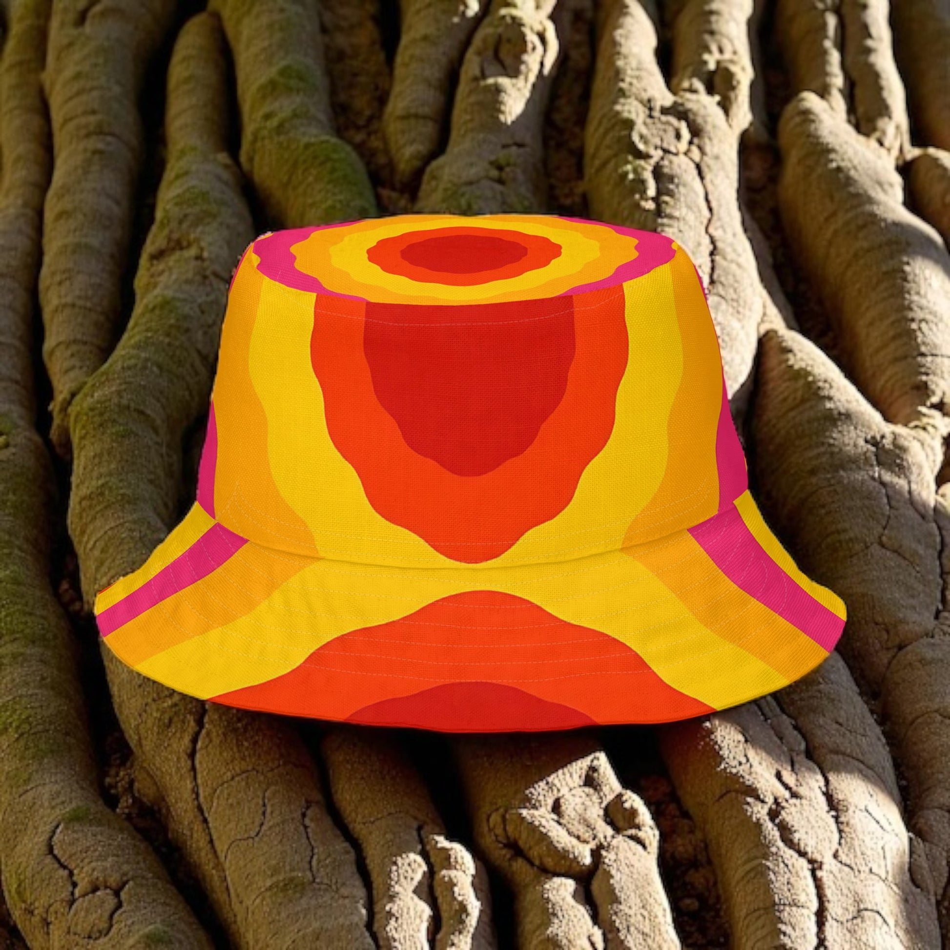 Colorful bucket hat with a turkey tail pattern on a tree