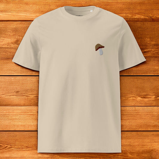 beige t-shirt with a porcini mushroom and a wood background