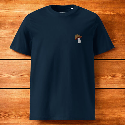 navy blue t-shirt with a porcini mushroom and a wood background